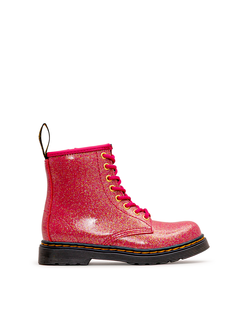 Vue extérieure de la botte Dr. Martens 1460 Glitter fuchsia pour enfants