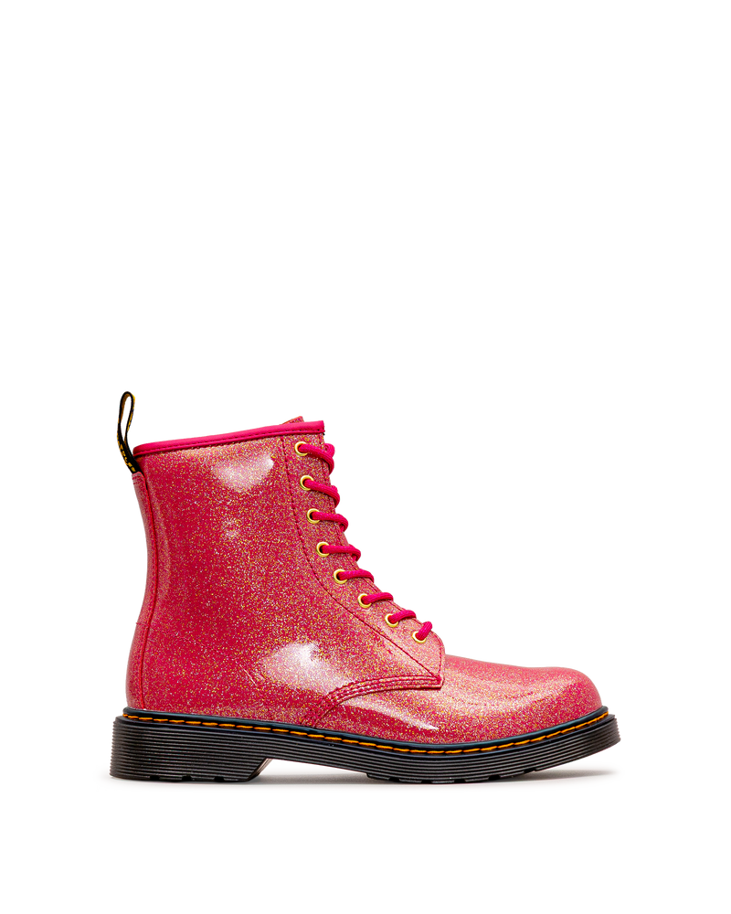 Vue extérieure de la botte Dr. Martens 1460 Glitter fuchsia pour enfants